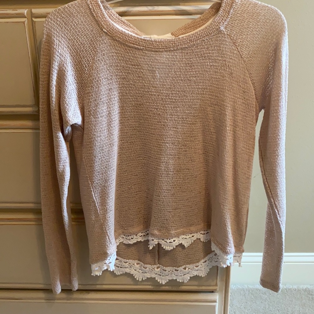 Tan sweater with lace at bottom and ties in back